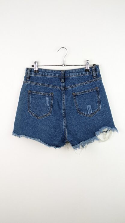 short jean taille haute bleu foncé griffures et franges sur le bas